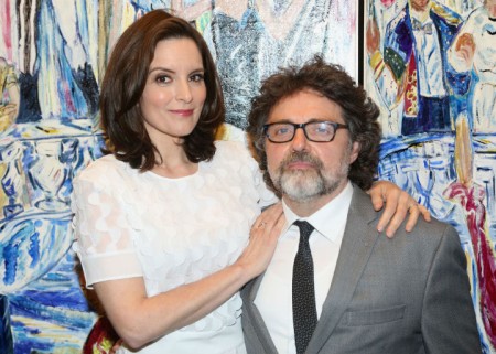 Tina Fey and her husband come together for a photo.